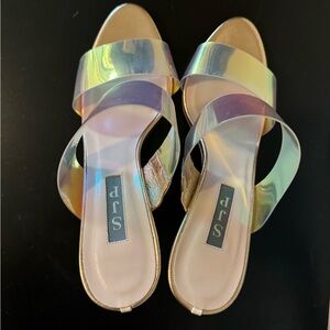 SJP clear iridescent heels.